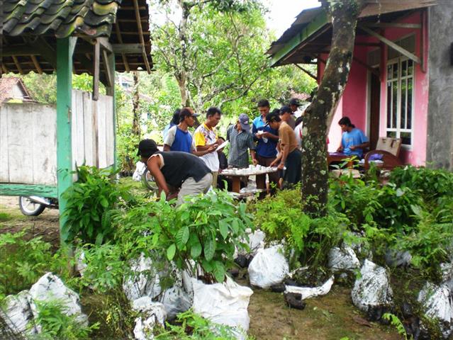 Villagers being registered by T4T staff before receiving various tree species to be planted riverside