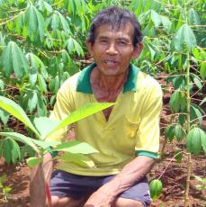 Farmer with his new seedlings